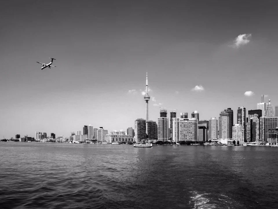 Toronto skyline across the water in black and white
